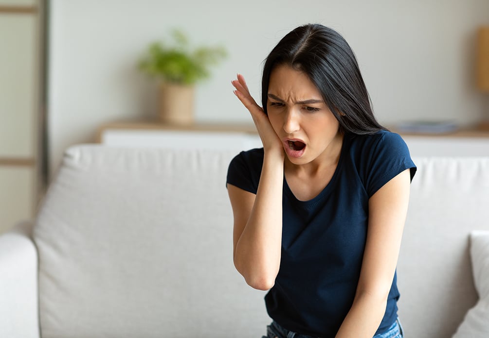 Girl Suffering From Tooth Pain