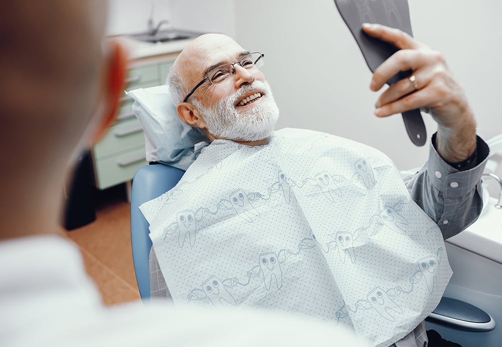 Older man at dentist